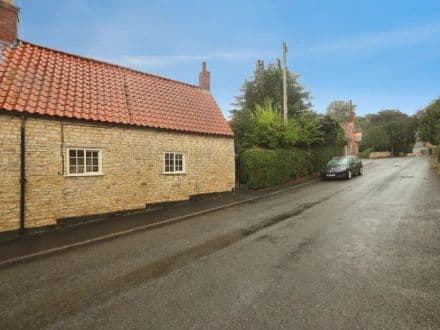 Charming two-bedroom listed semi detached cottage